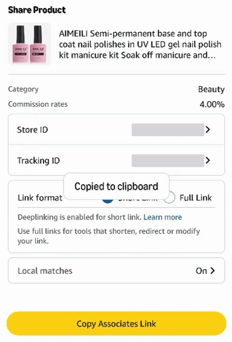 Panel Share Product de GetLink en la app de Amazon: categoría y comisión, Store ID y Tracking ID tapados, Link format con Short Link, aviso Deeplinking is enabled for short link y Use full links for tools that shorten, redirect or modify your link, y botón Copy Associates Link